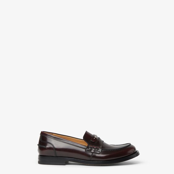 Fendi Varsity-inspired loafers featuring a strap with hand-sewn