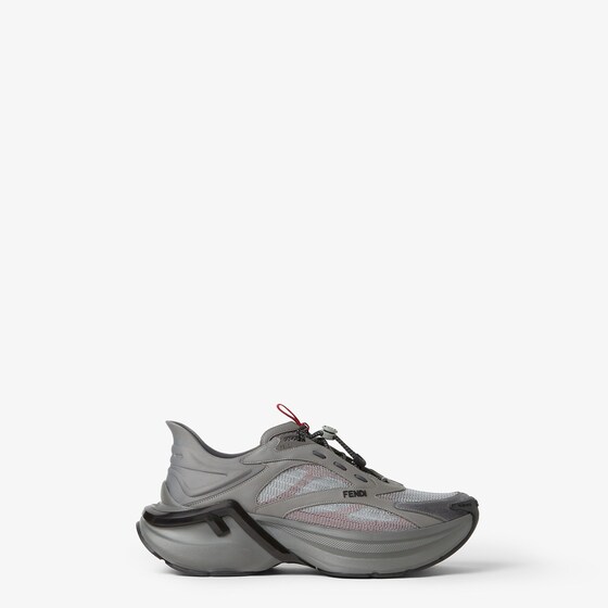 Slip-on running sneakers featuring elastic laces with lock