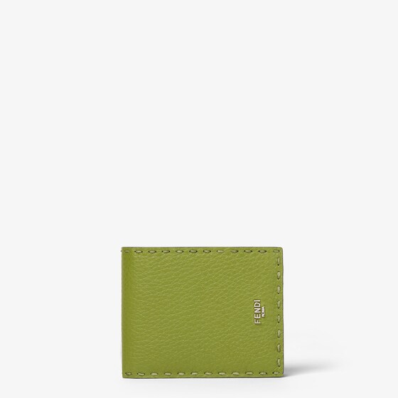 Fendi Bi-fold wallet features four card slots, a pocket