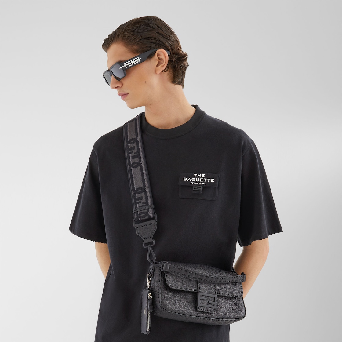 FENDI: Baguette messenger bag in ECONYL® - Black