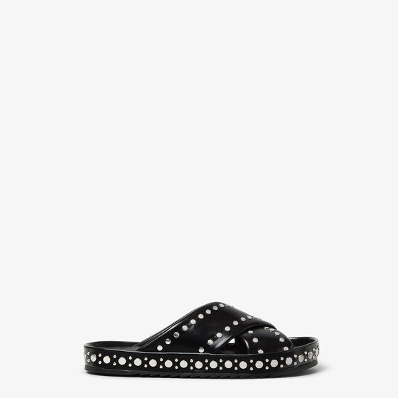 Fendi Two wide bands cross in a symmetrical embrace to create