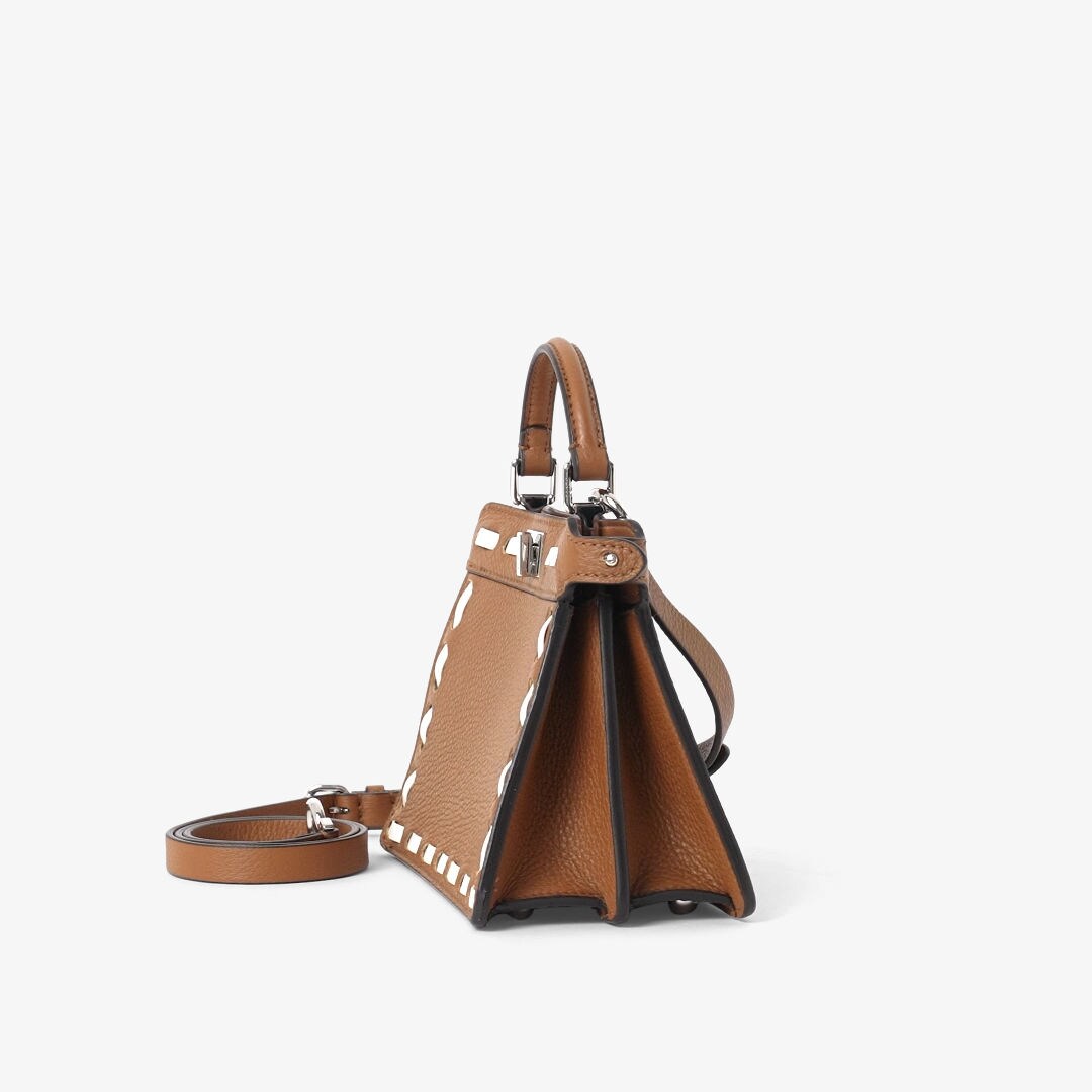 حقيبة Peekaboo ISeeU بحجم صغير جداً