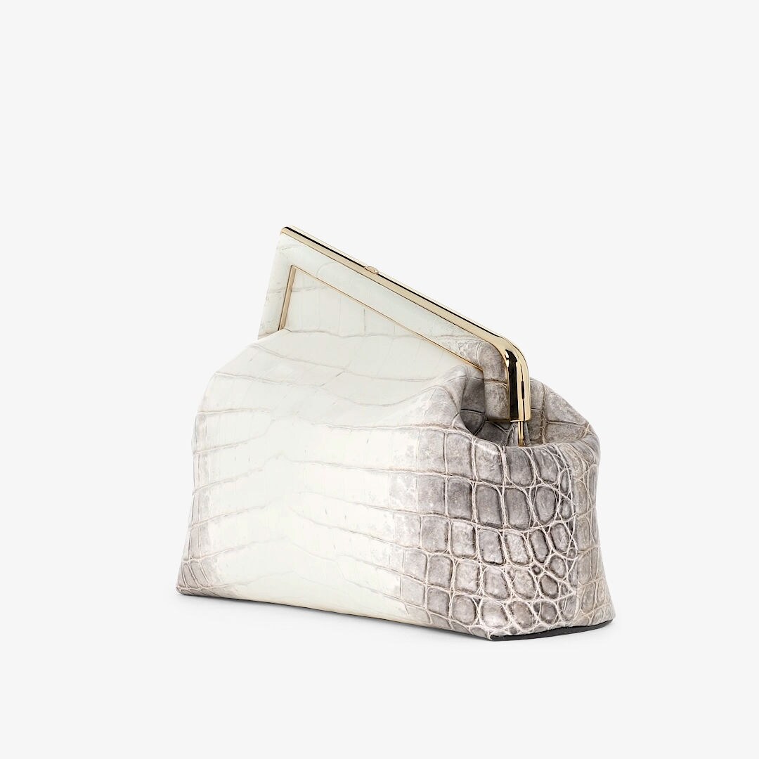 FENDI: Medium clutch bag in leather with logo - White