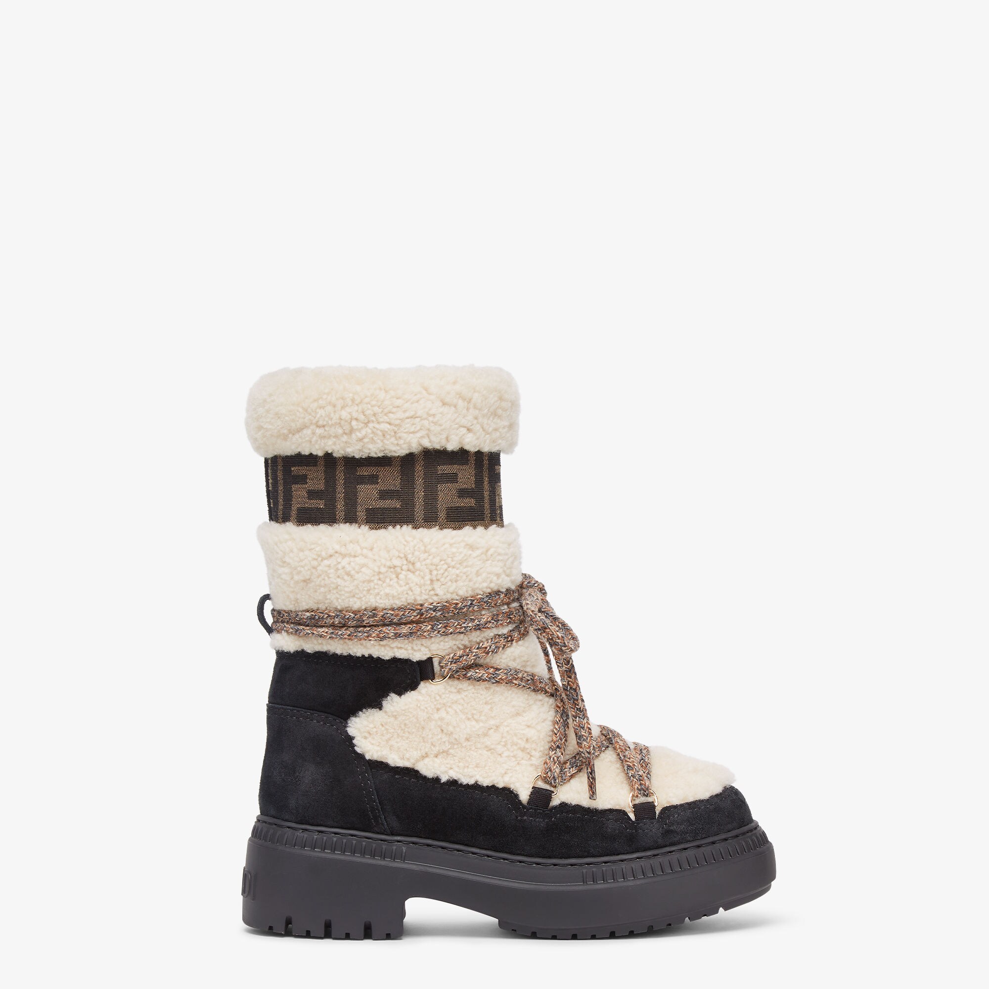 Apres Chic White sheepskin and black suede boots