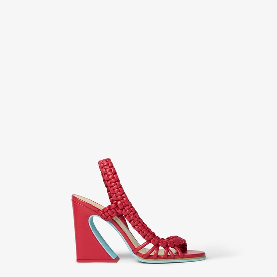 Asymmetric sandal with wide heel featuring the iconic Arco