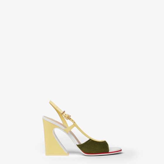 Asymmetric sandal with wide heel featuring the iconic Arco