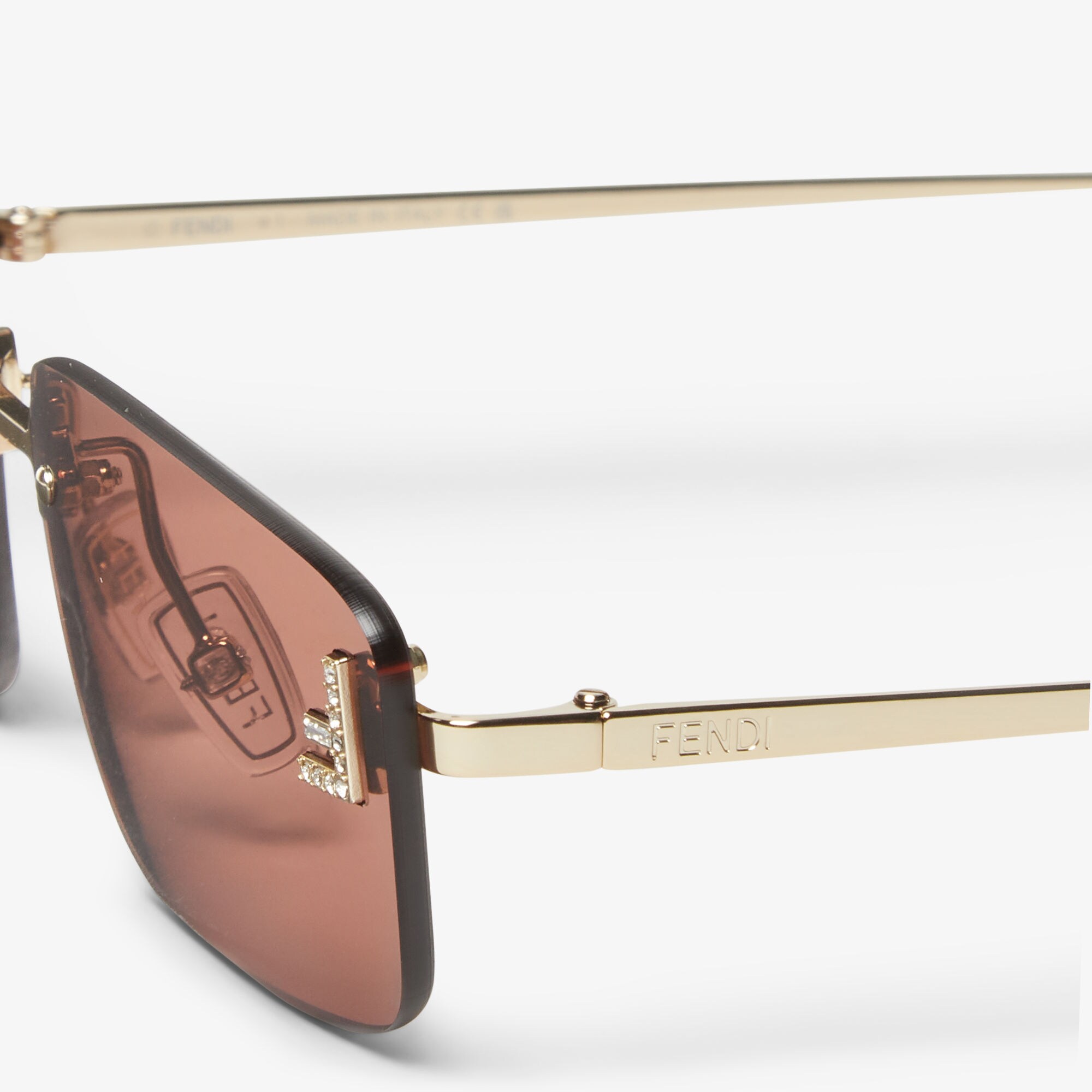 Fendi Brown Rectangle sunglasses ? Gradient Lenses
Italy FS166R 630 15 208 125 FENDI EYEWEAR Fendi Sky rimless rectangle-frame gold-tone  main image 2