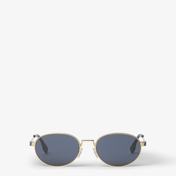 Fendi Metal oval sunglasses with a golden finish